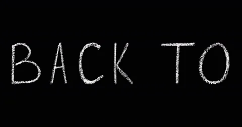 Welcome back to school handwritten white chalk lettering Stock Footage 89417923