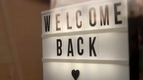 Welcome Back Sign Of A Business Reopening After Covid-19 Lockdown Stock Footage