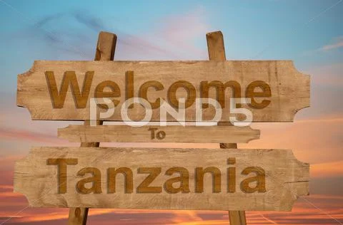 Welcome to Ecuador sing on wood background with blending national flag Stock Photos