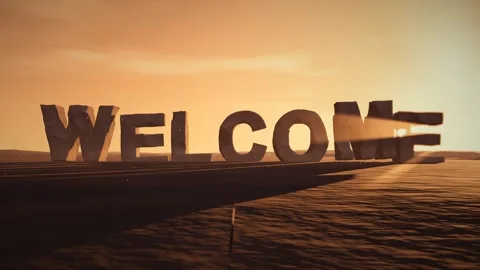 Welcome Giant Eroded Stone Letters Standing in a Desert at Sunset with Stock Footage 341806205