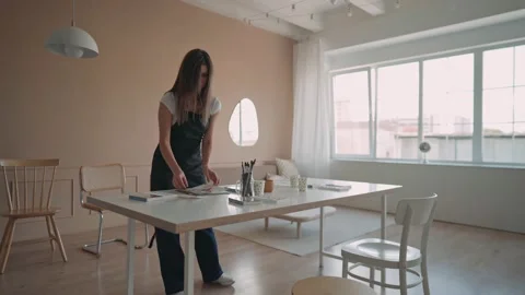 Welcome to the gouache drawing master class. Woman is preparing a place for Stock-Footage 159548076