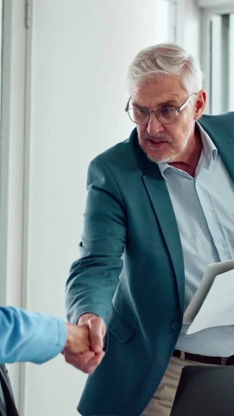 Welcome, handshake and man with folder in office meeting, contract agreement or Stock Footage 335353283