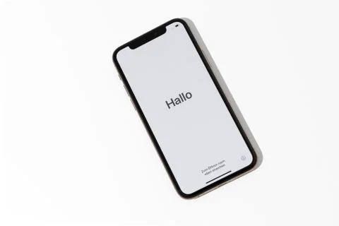 Welcome hello in different languages white screen on starting of the smartphone Stock Photos