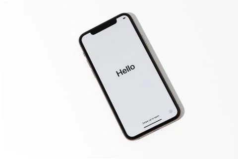 Welcome hello in different languages white screen on starting of the smartphone Stock Photos