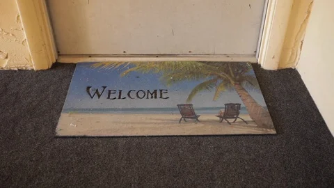 Welcome Mat with Tropical Backdrop Stock Footage 114018240