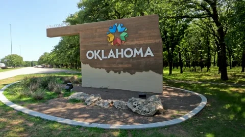 Welcome To Oklahoma Sign on I-35 With New Logo Design Stock Footage 243734071