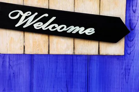 Welcome pointer on vivid blue background Stock Photos