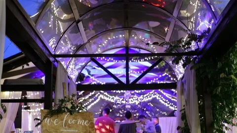 Welcome Sign. Guests Dancing On A Background. Stock Footage 123700385