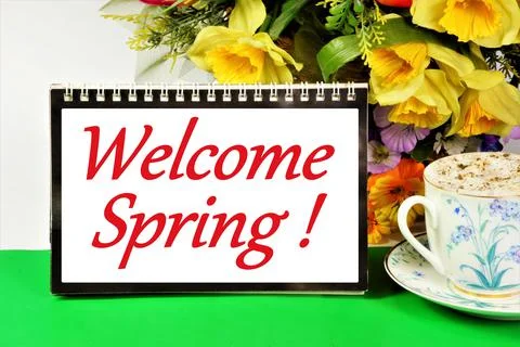 Welcome to spring. Text inscription of the greeting in the sign. Stock Photos