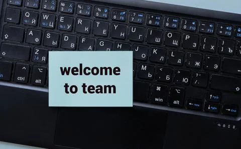 WELCOME TO TEAM text concept write on notebook. Stock Photos