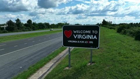 Welcome to Virginia. Sign on Interstate I-81 on border with MD. Travel Stock Footage 205445647