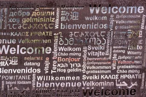 Welcome word in multiple languages and different scripts Stock Photos