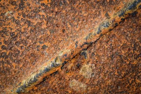 The weld on the scrap iron Stock Photos