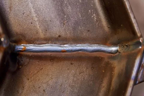 Weld. Welding of two Y-shaped profiles. Welding works plant. Stock Photos