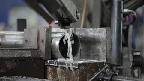 Welded seam on a section of a steel pipe with the help of a grinding machine in Video stock 142891345