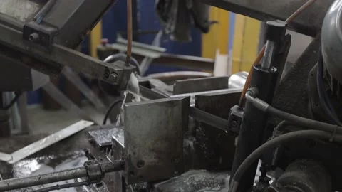 Welded seam on a section of a steel pipe with the help of a grinding machine in Stock Footage 142900670