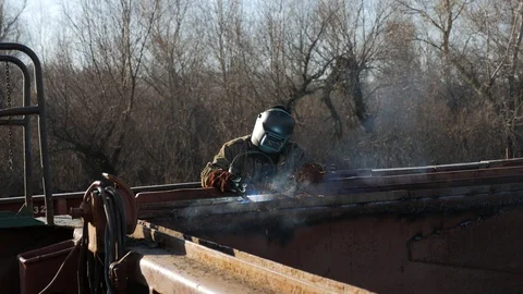 Welder are working inside the ship at the shipyard. Stock Footage 87393645