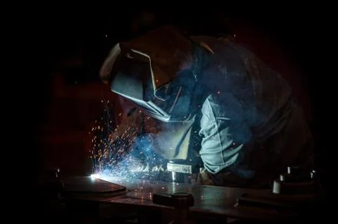 Welder on a black background Foto stock
