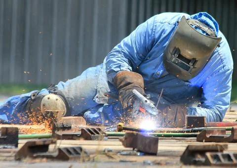 Welder In Blue Outside Stock Photos