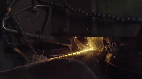 Welder complete with personal protective equipment is perform pipe welding in Stock Footage 77483059
