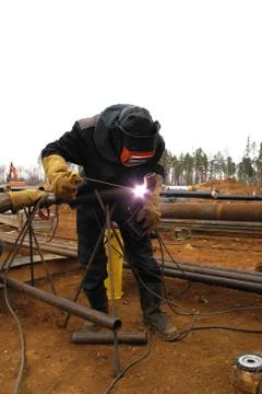 Welder at construction site Stock Photos