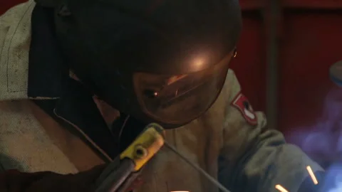 Welder cooks metal structures Stock Footage 95422133