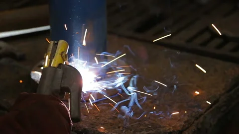 Welder cooks metal structures Stock Footage 95422177