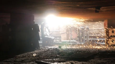 The welder at the dock is working, the sparks are pouring out Video stock 87320403