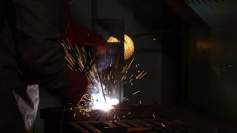 The welder is engaged in welding Stock Footage 122245413