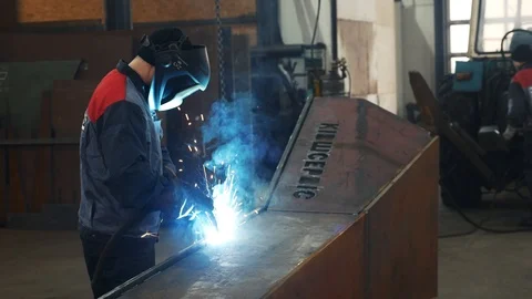 Welder at the factory Stock Footage 100348589