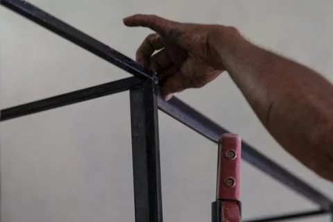 Welder in iron structure Stock Photos