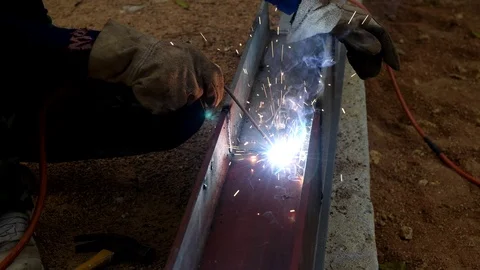 Welder iron at work in construction site Stock Footage 99021239