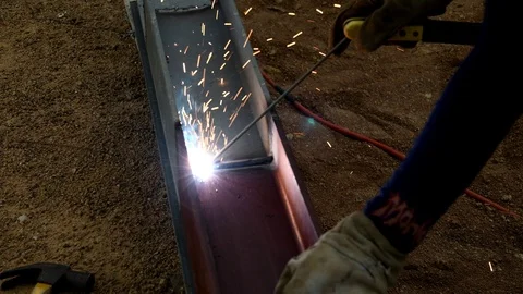 Welder iron at work in construction site Stock Footage 99021283