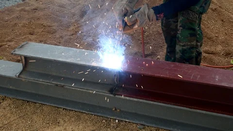 Welder iron at work in construction site Stock Footage 99021526