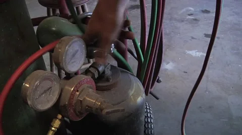 Welder lighting a cutting / welding torch Stock Footage 57362311