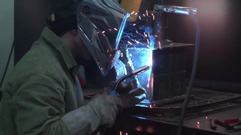 The welder makes the structure Stock Footage 145426907