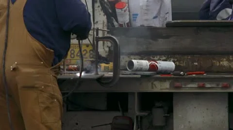 Welder Man on Back of Utility Truck Metalwork Stock Footage 22308341