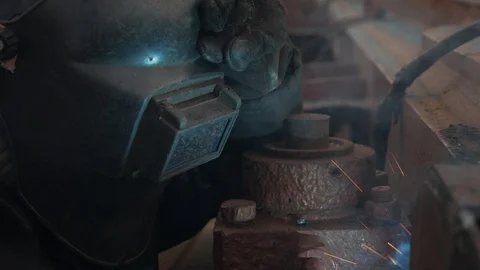 Welder in mask  is on the board of ship. Stock-Footage 87392346