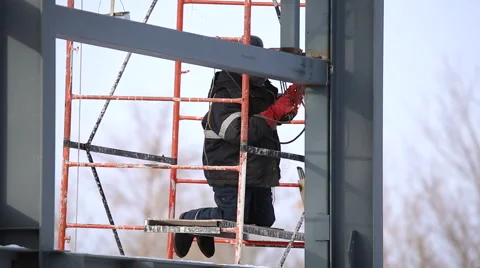 Welder operating at the height Stock Footage 46382540