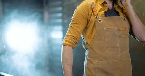 Welder with phone at the workshop Stock Footage 147295343