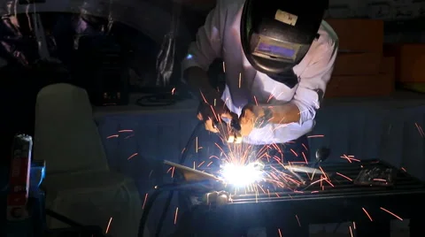 Welder with protective mask Stock Footage 60406578