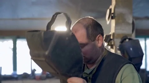 Welder is protective mask Stock Footage 77025561