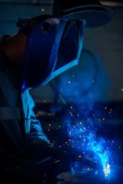 Welder with protective mask Stock Photos