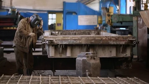 Welder starting welding at work in metal industry. Stock Footage 70208033