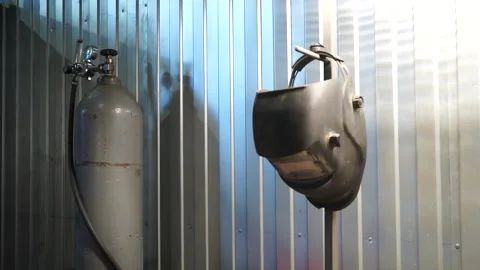 The welder takes a mask Stock Footage 145661002