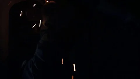 Welder uses instruments to install pipe inside new building Stock Footage 71671927