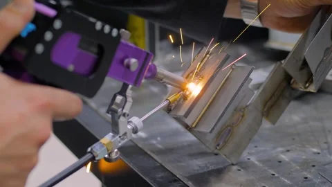 Welder is using portable handheld laser welding machine - close up Stock Footage 341320542