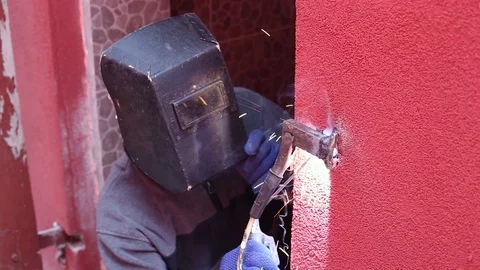 Welder with welding machine Stock Footage 69856711