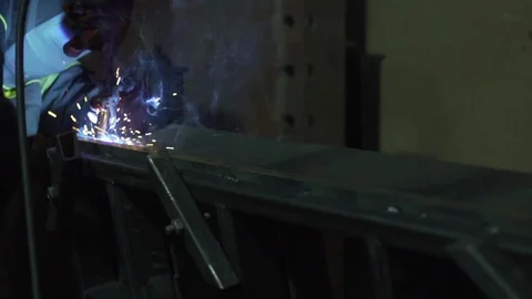 A welder is welding metal construction elements, close-up. 스톡 동영상 127054938