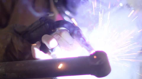 Welder welding a metal Stock Footage 68498902